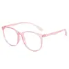 Gafas planas de moda anti luz azul con montura redonda, casuales y lindas, realzan el rostro, versátiles para fotografía callejera y uso casual