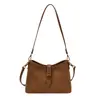 Bolso cubo de alta gama de nicho para mujer, nuevo modelo 2026, bolso cubo versátil simple retro coreano para hombro y cruzado