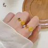 Anillo de Oro Arena Antigua de Alta Retención de Color Anillo Abierto de Flor Hueca Exquisito Nicho Dulce Versátil Anillo de Tendencia Nacional