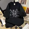Tendencia de moda estilo americano, camiseta de manga corta con estampado de letras pintado a mano retro para hombres y mujeres, corte holgado, algodón puro, para el verano