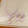 Brincos e colar de flor de zircônia em formato de gota d'água, corrente para clavícula de luxo leve e nicho, conjunto de joias de moda elegante estilo palácio atacado
