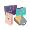 Bolsa de Cartón Blanco Tienda de Ropa Cosméticos Bolsa de Regalo Bolsa para Empaque de Regalo Bolso de Papel Kraft Procesamiento e Impresión Personalizada