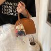 Bolso de mano de alta gama para mujer, primavera y verano 2025, nuevo, sencillo, para ir al trabajo, bandolera de hombro, bolso informal coreano con forma de concha