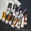Hilo de Cera Color Cielo Estrellado Negro y Café con Brillo Dorado Hilo de Cera Plano Redondo Colección