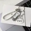 Conjunto Criativo de Chaveiro Cortador de Unhas, Ferramentas de Manicure e Pedicure, Limpador de Ouvido, Conjunto Quatro em Um, Pingente de Gatinho Fofo