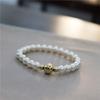 A NOSOTROS. Bolsa de oro de 14K no se desvanece con snitch estilo clásico simple Shi Jia Perla temperamento Pulsera Joker 6mm