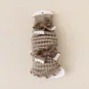 Nuevos estilos de otoño e invierno: calcetines largos engrosados con adorno de lazo para niñas, perfectos para Año Nuevo, proporcionando calor y actuando como calentadores de rodillas y piernas