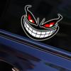 Comercio exterior diablo mala sonrisa ojos rasguño de coche creativo coche eléctrico motocicleta locomotora pegatina reflectante impermeable