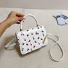 Bolsa Pequeña Cuadrada Fresca y Dulce de Mano para Mujer 2026 Verano Otoño Nuevo Color Cereza Bloque de Color Bolso de Hombro Único Bolso Cruzado para el Trabajo