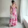 Popular vestido largo de tirantes con estampado floral rosa transfronterizo europeo y americano, entallado en la cintura, adelgazante, elegante, vestido de línea A estilo resort