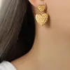 Pendientes con textura de doble capa y diseño de estrella con nicho de personalidad, colgantes de acero de titanio chapados en oro, venta al por mayor