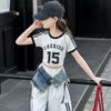 Traje para niñas Verano 2025 Nuevo Moda Infantil Estilo Occidental Pantalones Grulla Niños Grandes y Niñas Camisa de Manga Corta Conjunto de Dos Piezas