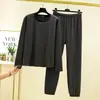 Nuevo conjunto de mujer para otoño e invierno: Conjunto de terciopelo a rayas alemán con cuello redondo y pantalones con puños, holgado, casual, engrosado, cálido para estar en casa
