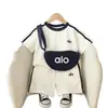Conjunto de Roupas de Verão para Meninos 2026 Novo Bebê Cor Sólida Listrado Bolsa Transversal Manga Curta Estilo Coreano Conjunto de Duas Peças de Verão para Crianças Tendência