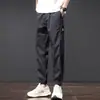 Calça masculina elástica na cintura, transfronteiriça, leve, slim fit, comprimento no tornozelo, moderna, adequada para o verão, adolescentes e estudantes, uso casual