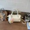 Bolsa Pequena Retrô Elegante para Mulheres 2026 Nova Moda Bolsa Transversal com Pingente Bolsa de Mão Sólida Exquisita Bolsa Almofada