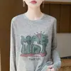 Nueva camiseta de punto casual de otoño para mujer con estampado de letras de dibujos animados, manga larga, cuello redondo, corte holgado, top fino y adelgazante