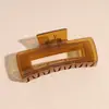 Pinza para el cabello con diseño geométrico de flor ámbar esmerilada distintiva de moda coreana, pinza para el cabello con diseño que combina con todo, pinza para el cabello con forma de tiburón