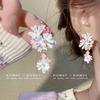 Vacaciones románticas ~ Pendientes con borlas de flores francesas 2024, nuevos pendientes de alta gama con diseño de nicho, accesorios para las orejas para mujer