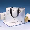 Bolsas de regalo personalizadas de alta gama, exquisitas bolsas de papel de mano, bolsas de regalo con un toque de lujo y sofisticación - Cielo Estrellado Plateado