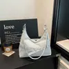 Tendência e versátil nova coleção de 2026 de bolsas de axila de nicho para mulheres, bolsas de ombro estilosas para mulheres, bolsas transversais de ombro de nicho para mulheres