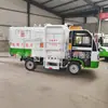 Vehículo de saneamiento eléctrico de cuatro ruedas camión de basura propiedad residencial carretera municipal vehículo de limpieza rápida vehículo de limpieza