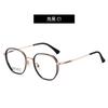 Gafas de titanio beta de estilo coreano, modernas, ligeras, con personalidad, montura redonda, flexibles, disponibles en stock, para miopía sencilla.