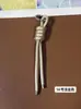 Llavero de cordón de cuero PU transfronterizo, colgante versátil para bolso, accesorios de decoración para botellas de agua y muñecas DIY, llaveros al por mayor