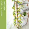 Simulación de margarita de ratán, flor falsa de ratán, girasol, aire acondicionado, tubería, bobinado, fondo interior, pared, ventana, decoración, sombra