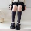Calcetines para niñas primavera y otoño algodón peinado calcetines de tubo color liso niños niñas coreanas aman calcetines de rayas verticales fabricantes lote