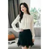 Tiro real Alta calidad Color albaricoque francés Camisa de gasa para mujer Chic suelta con diseño que disimula el abdomen Top de nicho de sentido del diseño
