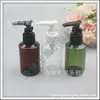 Botella de bomba transparente 100ml con bomba de clip, botella de hombro inclinado, botella de gel de ducha 100ML, botella de recarga de limpiador facial blanca