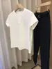 Tienda de Descuento Outlet Marca Liquidación Moda Camiseta de Manga Corta para Mujer, Estilo Corto de Verano, Top de Hombro Normal, Moderno