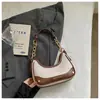 Bolsas de Moda 2026 Nova Bolsa de Mão em Forma de Lua Crescente para Mulheres, Estilo de Nicho, Bolsa de Ombro e Transversal Texturizada, Bolsa de Braço Versátil e Estilosa