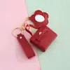 Colgante de Mini Bolso de Cuero PU Estilo Coreano Nuevo Transfronterizo con Espejo Almacenamiento Colgante de Bolso Pequeño Billetera Personalización