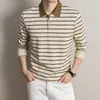 Camiseta de algodón a rayas acanaladas de manga larga para hombre, nuevo estilo otoño 2026, cuello camisero, casual, transpirable, cómoda, polo para hombre