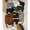 Yuanxi-2026 Otoño Estilo Minimalista Color Básico Bloque de Color Aspecto de Dos Piezas Cuello en U Manga Larga Camiseta para Mujer 266394