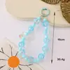Cadena para teléfono de pastel transparente estilo Ins con cuentas pintadas a mano, mismo estilo que se ve en las transmisiones en vivo, colgante de llavero con cuentas, accesorio para bolso