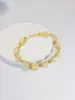 Pulsera Geométrica de Piedra Ojo de Gato de Lujo Ligero para Mujer, Joyería de Moda Versátil de Alto Nivel en Oro Rosa y Dorado, Accesorio Popular para la Mano