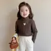 Suéter de niña otoño e invierno conejo 2026 nuevo cuello alto ropa interior para niños suéter de punto suéter de lana para bebé capa base