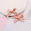 Novo estilo fita canelada com borda dourada laço pequeno DIY decoração de roupas bonecas caixas de presente sapatos e chapéus acessórios combinando