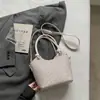 Bolsa Pequena Super Versátil para o Dia a Dia Feminina 2026 Nova Verão Leve Luxo Textura Trançada Ombro Único Transversal Bolsa Saco