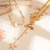Collar de dos piezas estilo vacacional costero, con imitación de marisco metálico, perla de imitación, estrella de mar y caracola. Collar de nicho de alta gama para mujer.