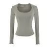 Ropa de mujer de estilo europeo y americano transfronteriza INS al por mayor: Camiseta básica puramente seductora de escote bajo, realzadora del busto, de manga larga, corte ajustado, elástica, con dobladillo