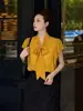 Artículo de moda caliente al por mayor transfronterizo para mujer 2026 Estilo elegante francés cuello en V manga corta top camisa HBZWW919636