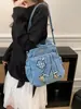 Versátil Bolso de Mezclilla Bordado de Alta Gama Tres Vías 2026 Nuevo Bolso de Hombro de Nicho Bolso Cruzado Texturizado