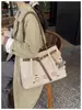 Bolsa tote feminina transfronteiriça 2026 nova verão grande capacidade bolsa de mão casual moda executiva escolar bolsa de ombro