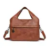 Bolsa de Mão Retrô de Couro Macio Transfronteiriça para Mulheres 2026 Novo Estilo Simples Casual Multicompartimentos Grande Capacidade Ombro Transversal
