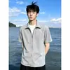 Camiseta Polo de color gris claro liso, moderna y a la moda, de manga corta para hombre, nuevo top holgado de pullover de verano 2026