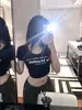 Camiseta de Encaje Negra Estilo Spice Girl de Manga Corta para Mujer Verano Espalda Descubierta Diseño Puro Deseo Sexy Ajustado Top Corto